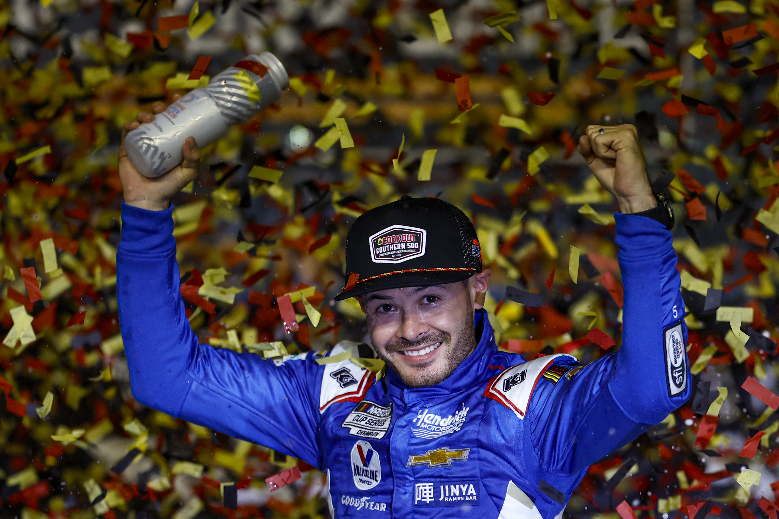 Kyle Larson celebrates in victory lane Sunday night at Darlington Raceway after winning the Southern 500, giving him an automatic berth in the next round of the playoffs. Photo: Getty Images for NASCAR.